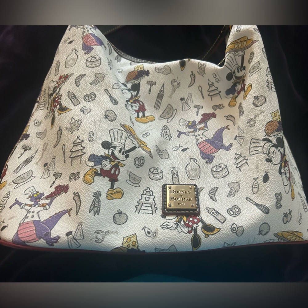 Used Authentic Disney Parks 2018 Food and Wine Festival Dooney and Bourke bag.